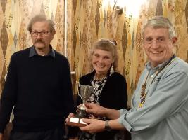 Keith and Caroline receive  trophy from President Andrew Barwood